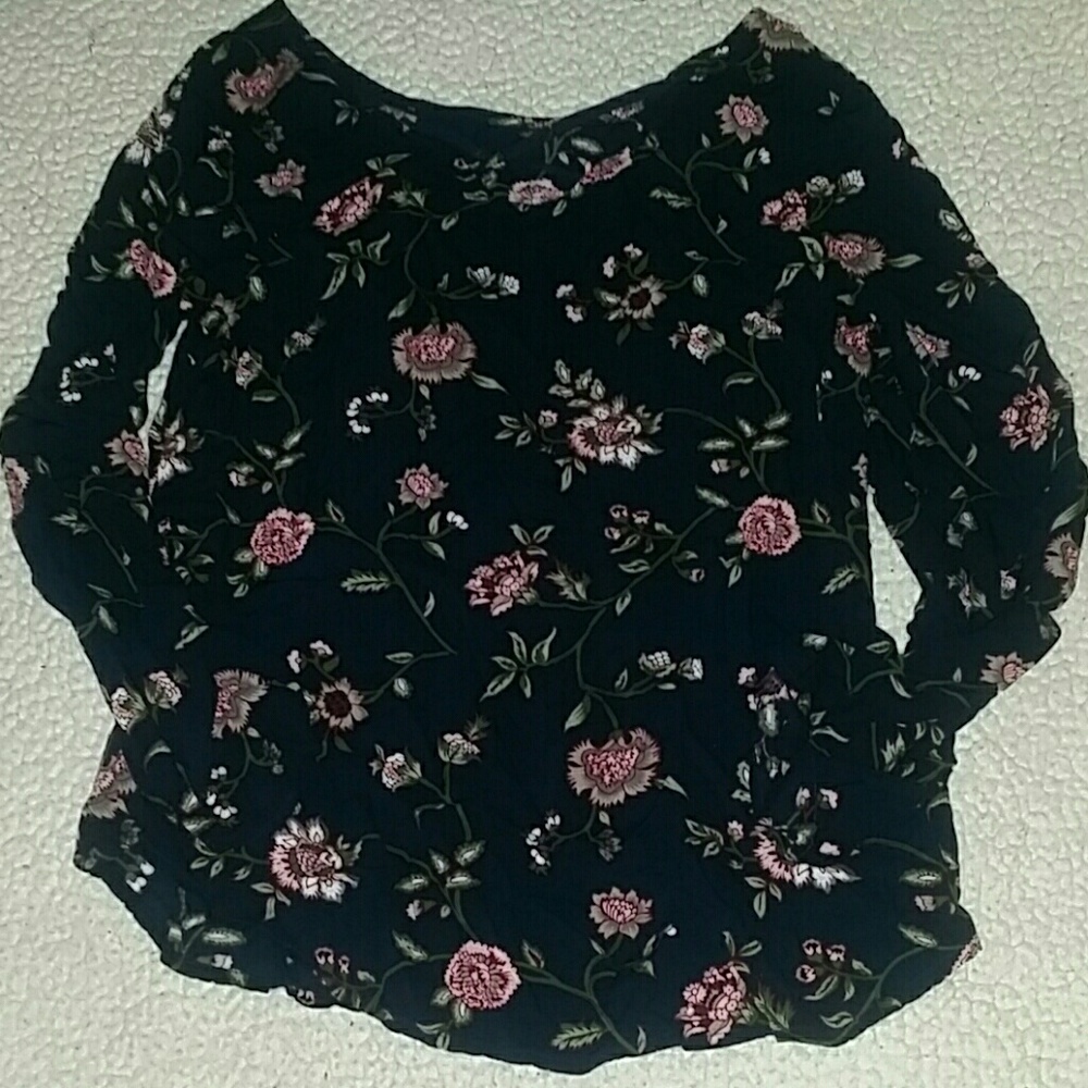 A floral blouse/shirt
